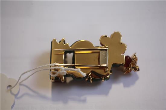 A Seaman Schepps 18ct gold, nephrite and gem set clip brooch modelled as an Oriental gentleman on a horse, 56mm.